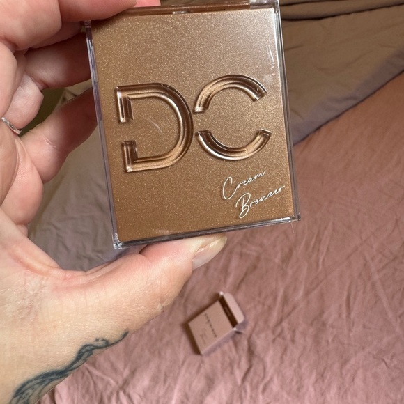 Dominique Other - NIB Dominque Cosmetics silk tone Cream Bronzer med tan